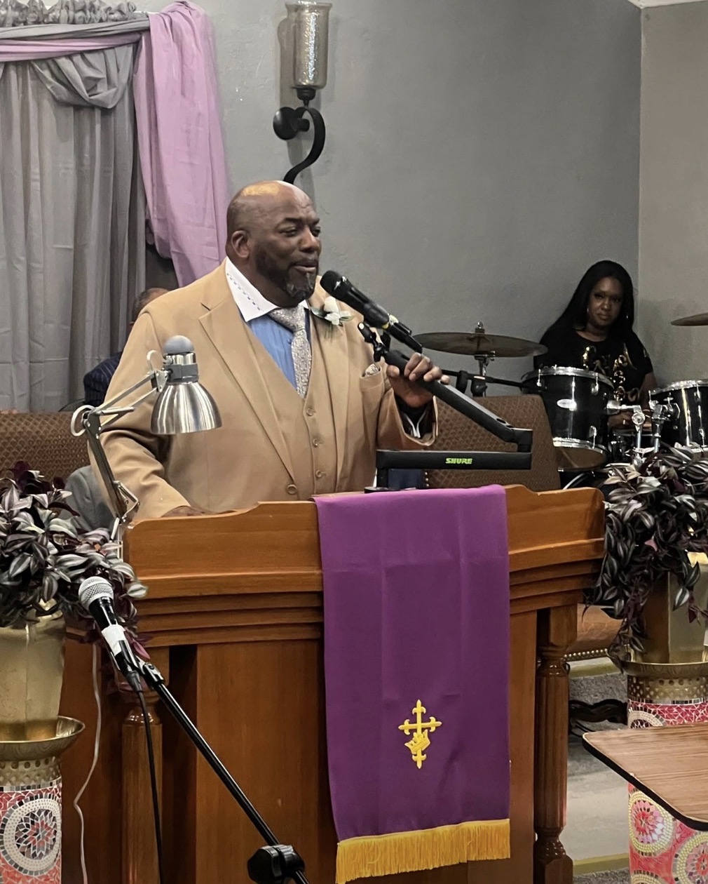 Pastor Jamison preaching the Word during another Sunday service