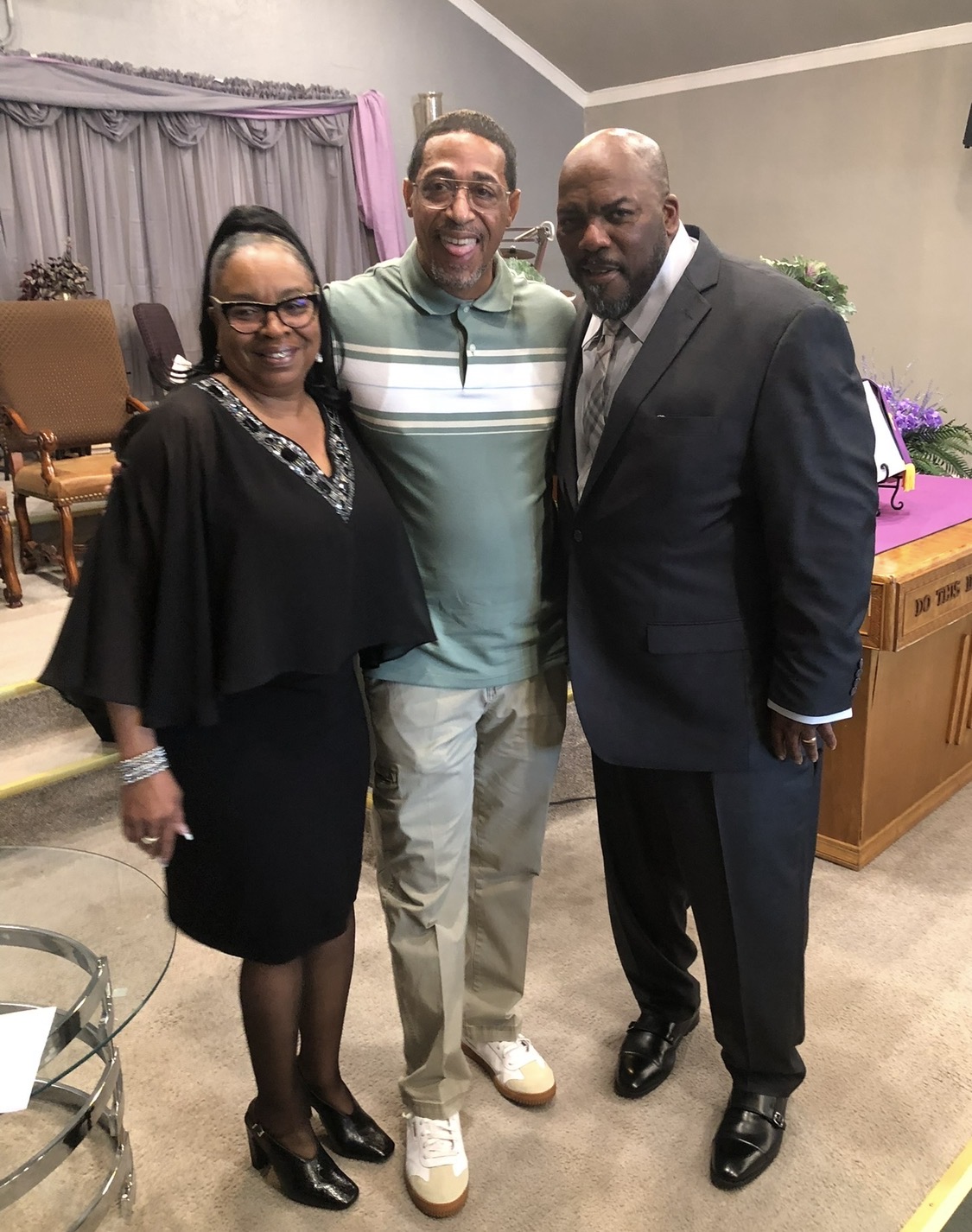 Pastor Jamison greeting members before service